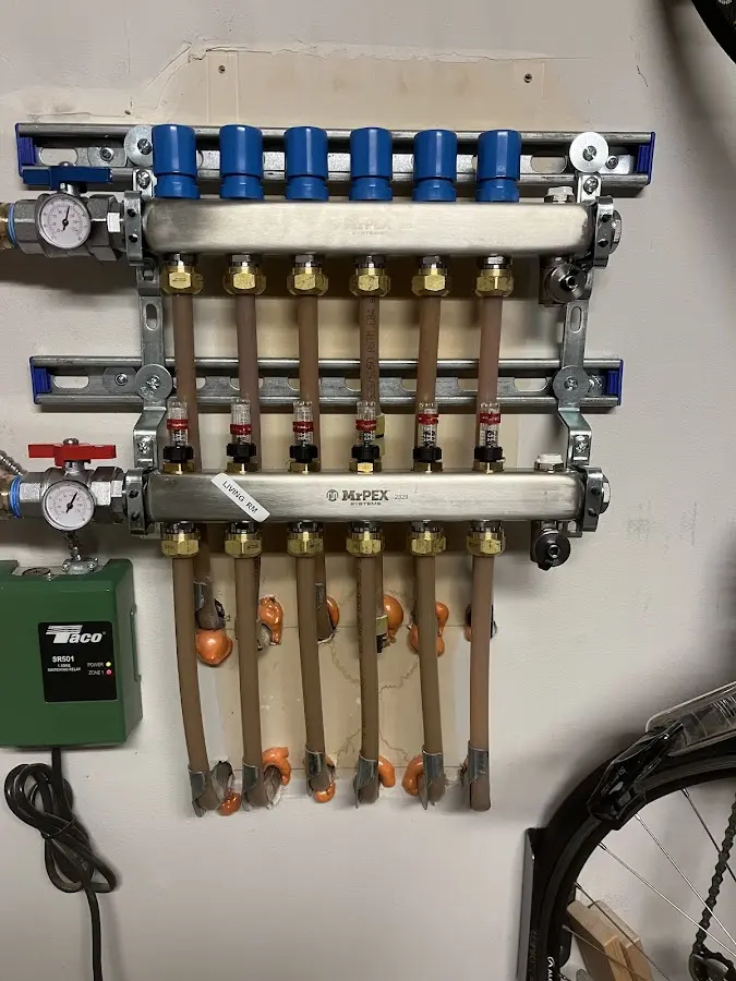 Plumber performing Leak Detection at a residential property in Manville